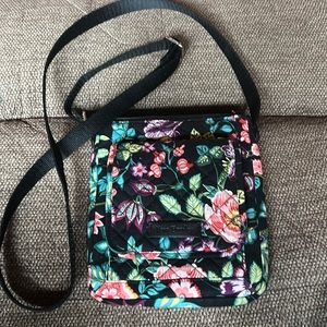 7” X 9” bag magnetic flap w/credit card slots . 2 zippered closured  pockets .